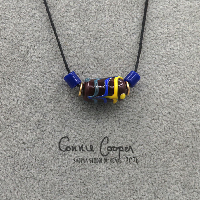 1-Bead in  Brown w/Raked Teal, Blue & Yellow OB26-7833