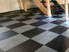 Ribtrax Smooth 12-Series Interlocking Tiles – 12" x 12" x 0.25", 10 tiles per case. Durable, slip-resistant, and made in the USA. Ideal for garages, workshops, and more.
