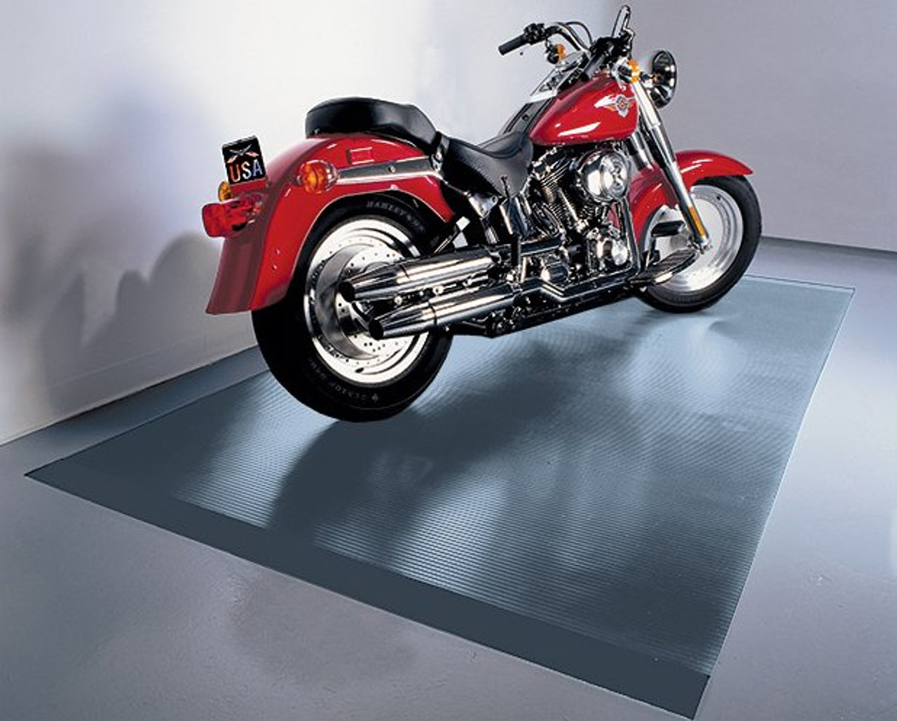 Motorcycle mat is available in Midnight Black and Slate Grey, 5' x