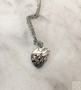 "You are here" Human Heart Necklace in Rhodium Plated Silver.