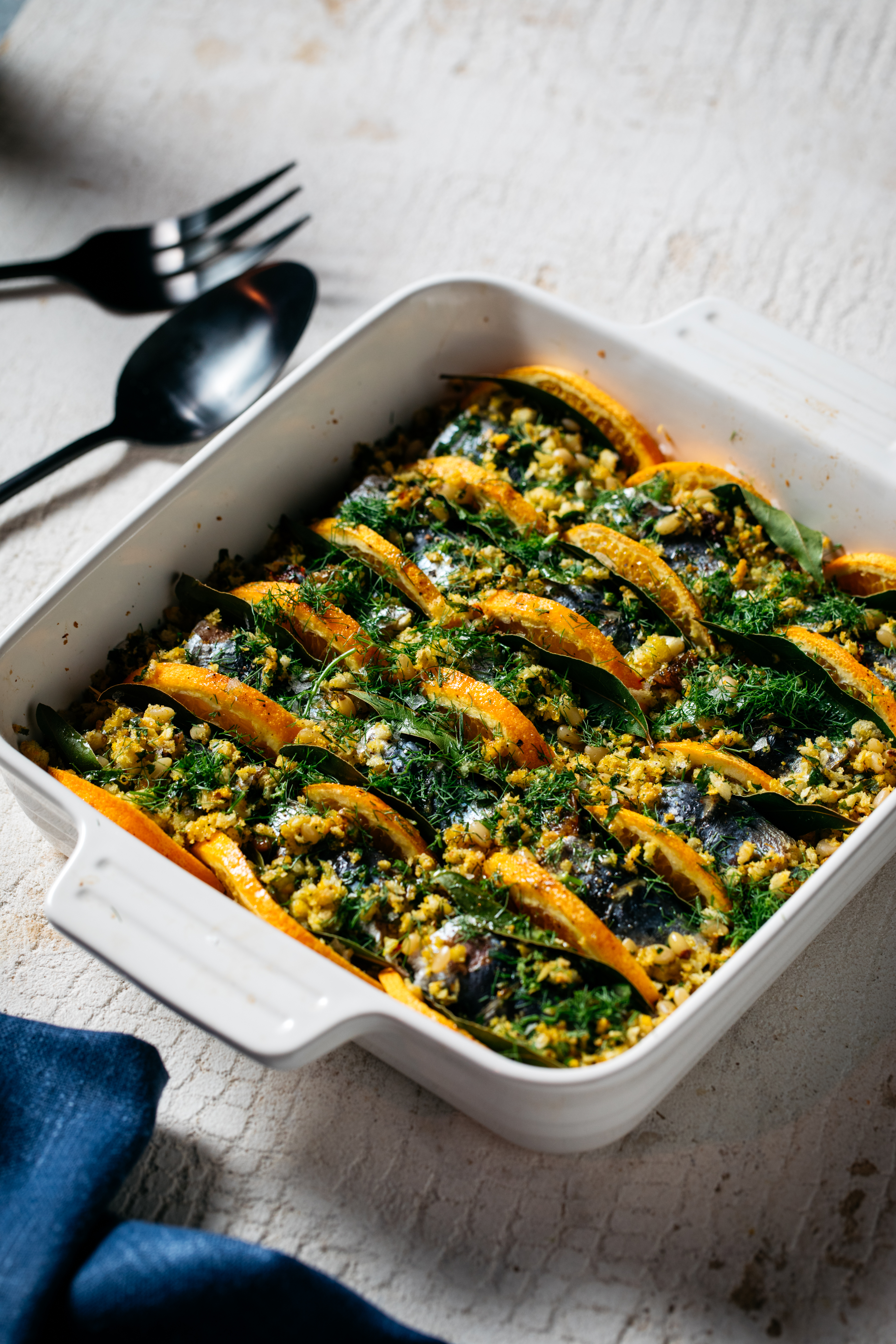 sicilian stuffed sardines in a chasseur white square baker from the TV Show on SBS The Cook Up with Adam Liaw