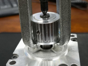 How to remove a pulley gear from a stepping motor? How to remove a pulley gear from a stepping motor?