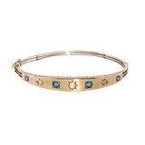 A Victorian Gold Bangle with Sapphires and Diamonds A Victorian Gold Bangle with Sapphires and Diamonds