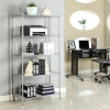 Five-shelf metal storage unit with steel wire rack, holding books and office supplies, in a modern office setting with a desk and chair nearby.