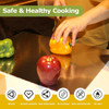 Honesty House stainless steel cutting board with lip for kitchen, silver color, cutting vegetables and fruits, placed on a countertop with apple.