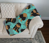 Black and Tan Pomeranian Artwork Pattern Quilted Throw Blanket 50" x 60" product image at NuMercy 3
