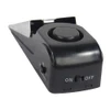 Black Super Door Stop Alarm with ON/OFF switch and button, featuring a sleek design and compact size.