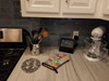 Lots of Red and White Papillon Oven Mitt product image at NuMercy 3