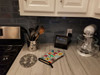 Lots of Black and White Papillon Oven Mitt product image at NuMercy 3