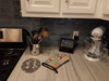 Lots of Orange Pomeranian Oven Mitt product image at NuMercy 3