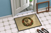 Sealyham Terrier Christmas Flowers Doormat 24H X 36W product image at NuMercy 4