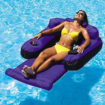Swimline Ultimate Inflatable Floating Pool Lounge Chair, purple, with woman in yellow bikini relaxing on it in the water.