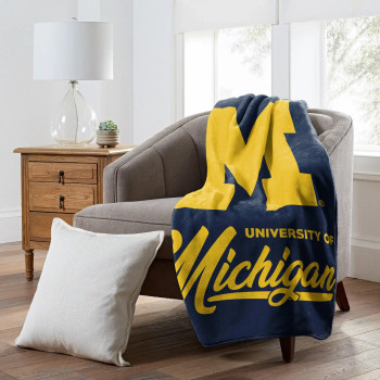 NCAA Michigan Wolverines Signature Raschel Throw Blanket