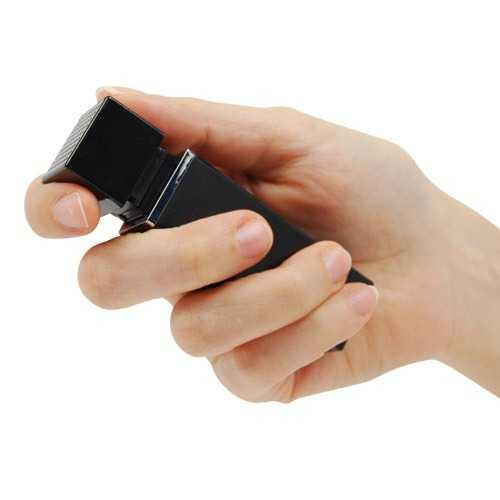 Safety Technology Fashionable Lipstick Alarm Black device held in hand.