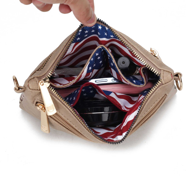 Tan Alisson Vegan Leather Women Printed FLAG Crossbody with Wristlet Bag, open showing American flag lining and interior with zippered pockets.