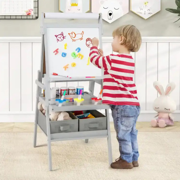 Gray 3-in-1 art easel for kids with magnetic chalkboard and whiteboard, colorful drawing supplies on a kid-friendly standing easel.