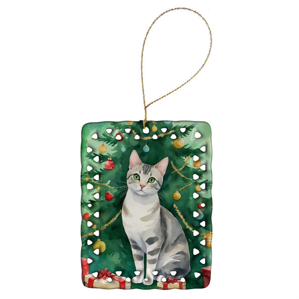 European Shorthair Cat By the Christmas Tree Porcelain Ornament product image at NuMercy