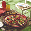 Emile Henry Ribbed Pizza Stone in Burgundy