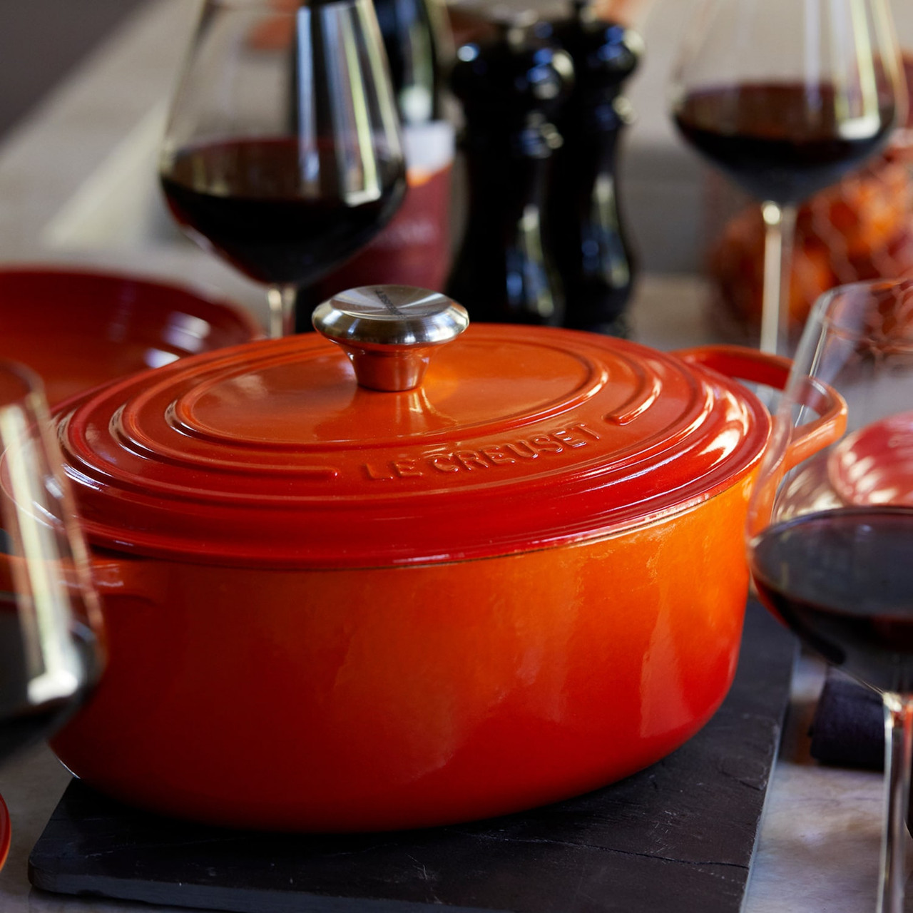 https://cdn11.bigcommerce.com/s-hccytny0od/images/stencil/1280x1280/products/3676/14538/le-creuset-oval-dutch-oven-flame__49787.1617191584.jpg?c=2?imbypass=on