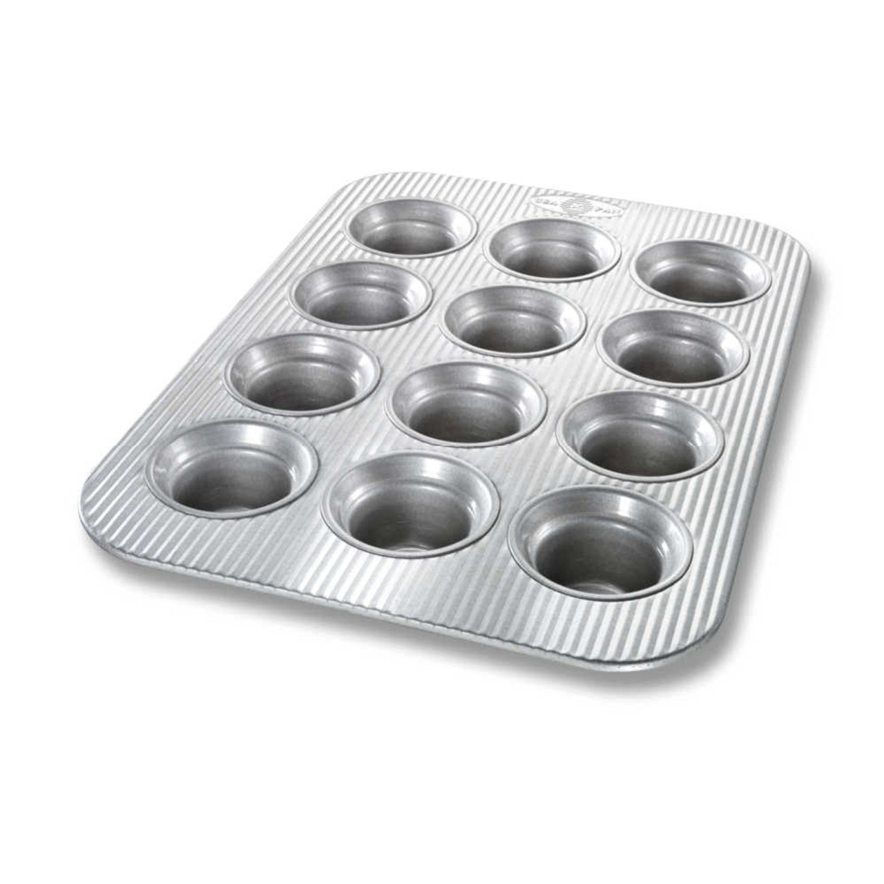 https://cdn11.bigcommerce.com/s-hccytny0od/images/stencil/1280x1280/products/4924/20797/USA_Pan_12-Cup_Crown_Muffin_Pan__13520.1658515751.jpg?c=2?imbypass=on