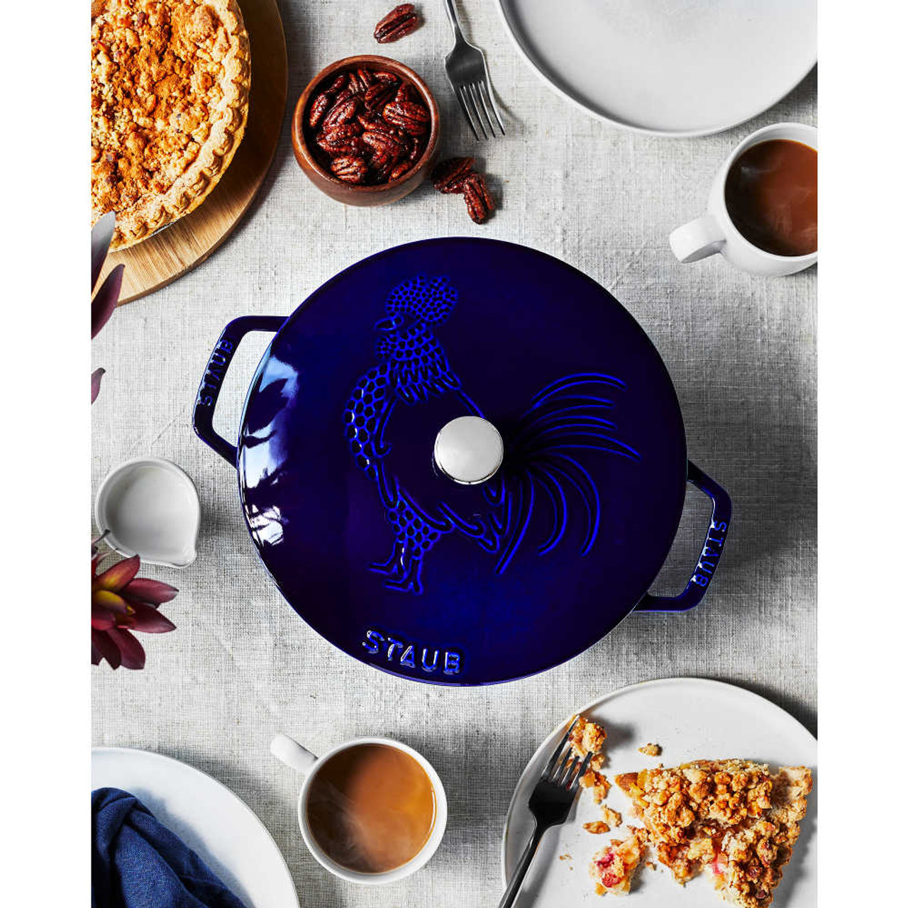 https://cdn11.bigcommerce.com/s-hccytny0od/images/stencil/1280x1280/products/5793/26608/Staub_Cast_Iron_Essential_French_Oven_Rooster_in_Dark_Blue__40320.1702575121.jpg?c=2?imbypass=on