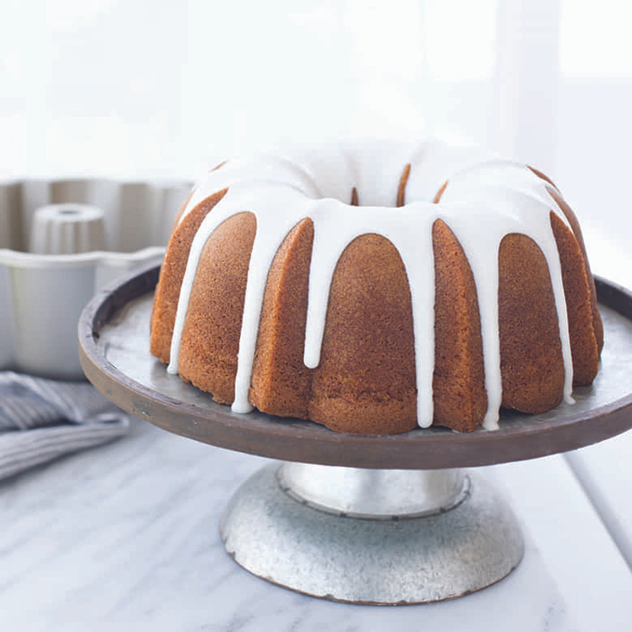 https://cdn11.bigcommerce.com/s-hccytny0od/images/stencil/1280x1280/products/720/4010/nordic-ware-anniversary-bundt-pan-1__10049.1587833623.jpg?c=2?imbypass=on