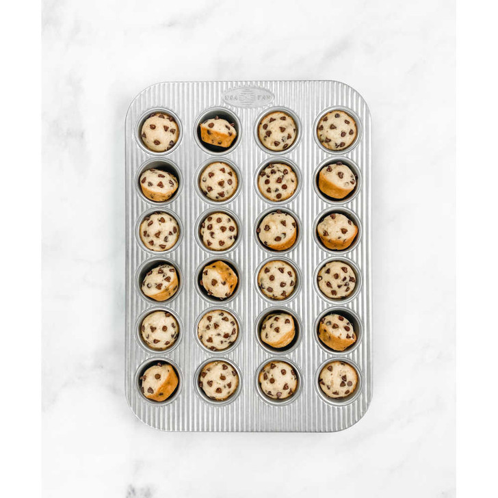 https://cdn11.bigcommerce.com/s-hccytny0od/images/stencil/728x728/products/4737/19310/USA_Pan_24-Cup_Mini_Muffin_Pan__82721.1652457282.jpg?c=2