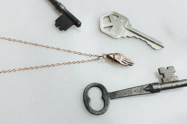 Hand Bronze Necklace