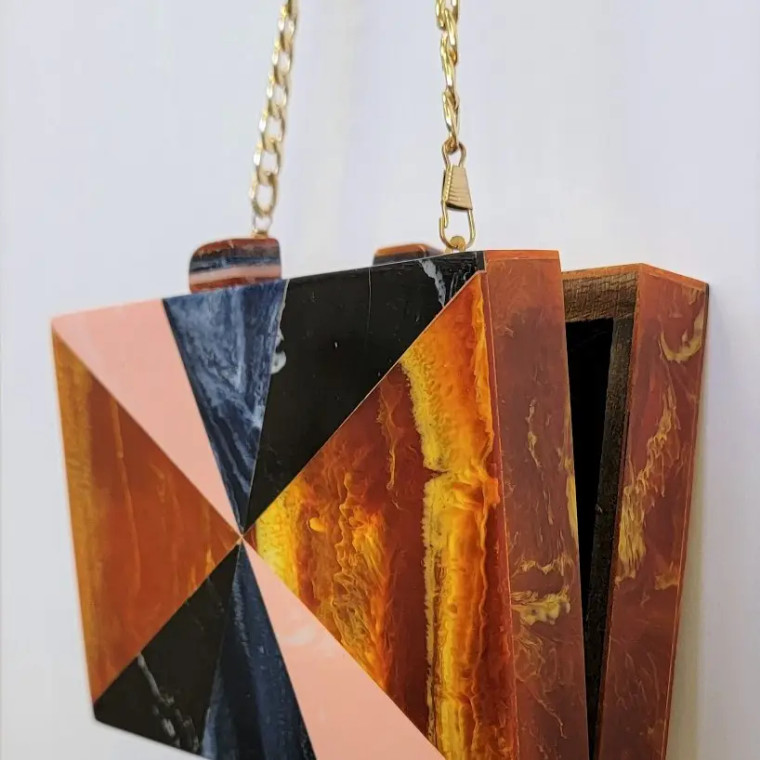 Warm tones lucite inlay wood clutch bag