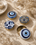 Evil Eye Metal Trinket Small Boxes, Set of 4 — curated, editorial travertine lifestyle photo