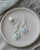 Sterling Silver Larimar Oval Earrings with Teardrop Twist Design Frame - Earrings