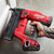 Milwaukee M18FN18GS-501B 18V Fuel Straight Second Fix Nail Gun with 1x 5.0Ah Battery, Rapid Charger & Contractor Tool Bag