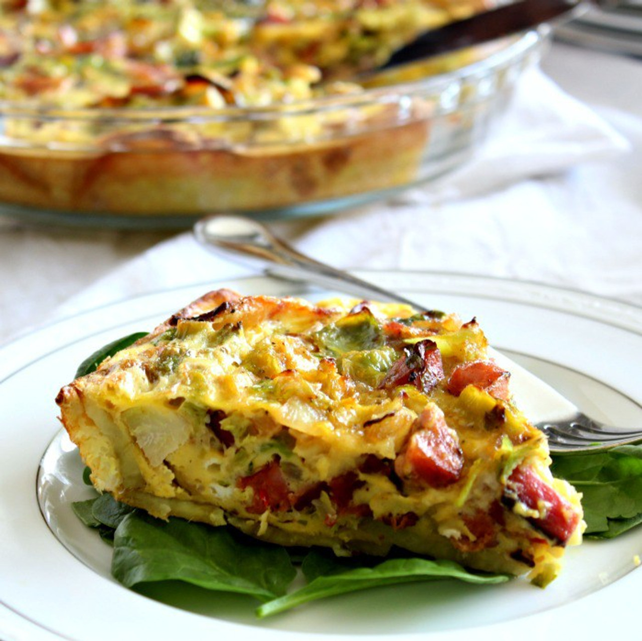 Brussels, Sausage & Bacon Quiche with Sweet Potato Crust