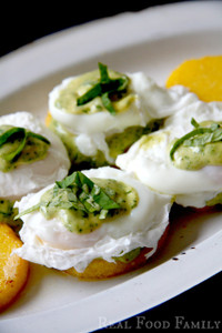 Gluten Free Eggs Benedict on Polenta Cakes with Pesto Hollandaise