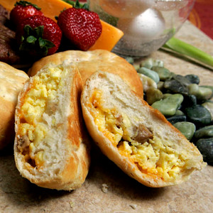 Southern Style Biscuit Stuffed with Egg, Sausage and Cheddar Cheese - 14 per tray Southern Style Biscuit Stuffed with Egg, Sausage and Cheddar Cheese - 14 per tray