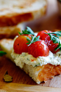 Marinated Cherry Tomatoes with Whipped Ricotta on Sourdough Marinated Cherry Tomatoes with Whipped Ricotta on Sourdough