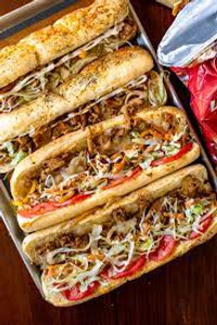 Original Philly Cheesesteak Co. Fully Cooked Sliced Chicken Steak 2.5 lb. - 4/Case Original Philly Cheesesteak Co. Fully Cooked Sliced Chicken Steak 2.5 lb. - 4/Case