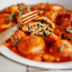 Sergio’s Signature Spinach Garlic Raviolis with Marinara Sauce - includes 24 Ravioli & 2 Marinara Sauces Sergio’s Signature Spinach Garlic Raviolis with Marinara Sauce - includes 24 Ravioli & 2 Marinara Sauces