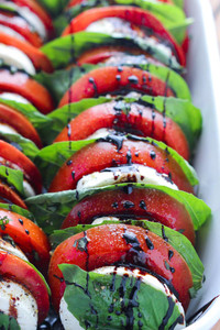 TOMATO MOZZARELLA SALAD WITH BALSAMIC REDUCTION TOMATO MOZZARELLA SALAD WITH BALSAMIC REDUCTION