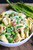 Creamy Spring Tortellini with Peas Asparagus and Bacon