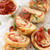 Mini Stuffed Pizza Bread Slices - 50 pieces per tray Mini Stuffed Pizza Bread Slices - 50 pieces per tray