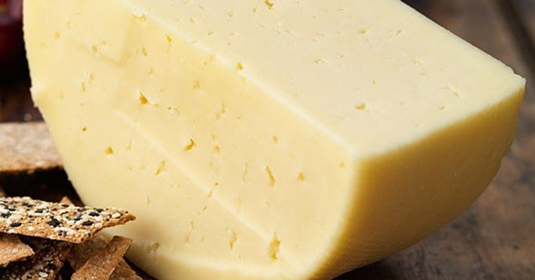 TINE Norvegia, a golden Gouda-style Cheese - 1 lb -