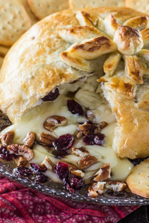 BAKED BRIE EN CROUTE WITH HONEY, CRANBERRIES AND PECANS