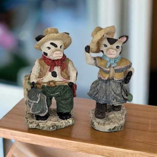 Pair of Vintage Resin Cowboy Cow Figurines