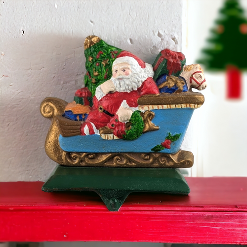 Vintage Cast Iron Santa in Sleigh Stocking Holder