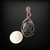 Copper wire wrapped pendant with a flower carved black onyx cabochon