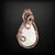 Handmade copper wire wrapped pendant featuring a carved rainbow moonstone cabochon.