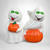 Vintage Ceramic Ghosts with Green Eyes and Pumpkin Figurine