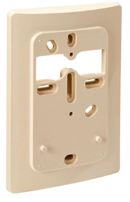 Johnson Controls T-4100-103, beige electrical wall plate or cover with multiple openings for electrical components.