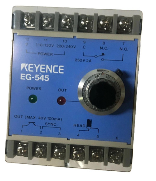 Keyence EG-545, industrial electronic relay with blue faceplate, wiring terminals at top and bottom, adjustment dial in center, and indicator lights for power and output status.